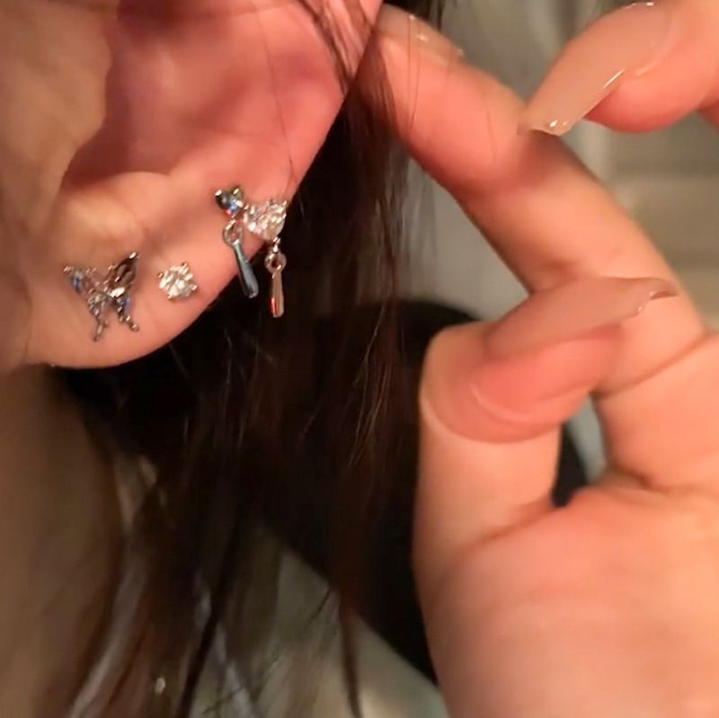 Boucles d'oreilles papillon en zircon liquide pour femme, design de niche, style haut de gamme, boucles d'oreilles uniques, lot de 6 pièces, clous d'oreilles_voghion.com