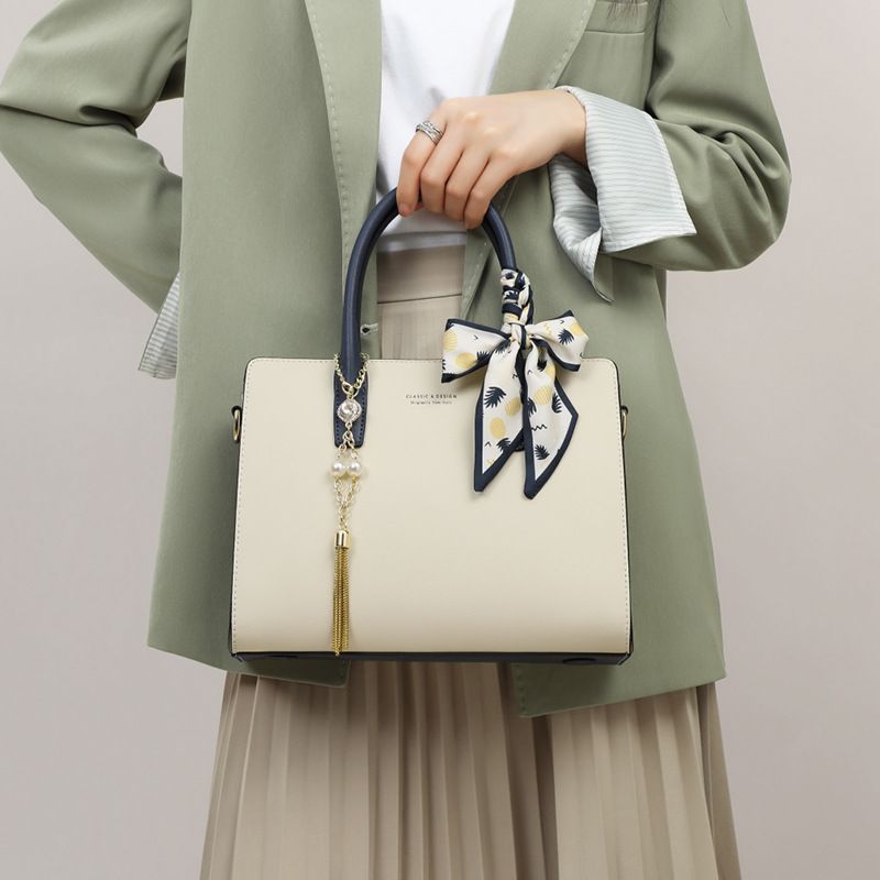 Nova bolsa de maternidade para outono e inverno, bolsa de escritório, couro de nicho, textura de alta qualidade, bolsa transversal de grande capacidade_voghion.com