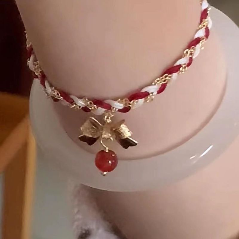 Rode strikarmband met een zoete, eenvoudige sfeer, geweven koord om cadeau te doen aan vriendinnen en accessoires_voghion.com