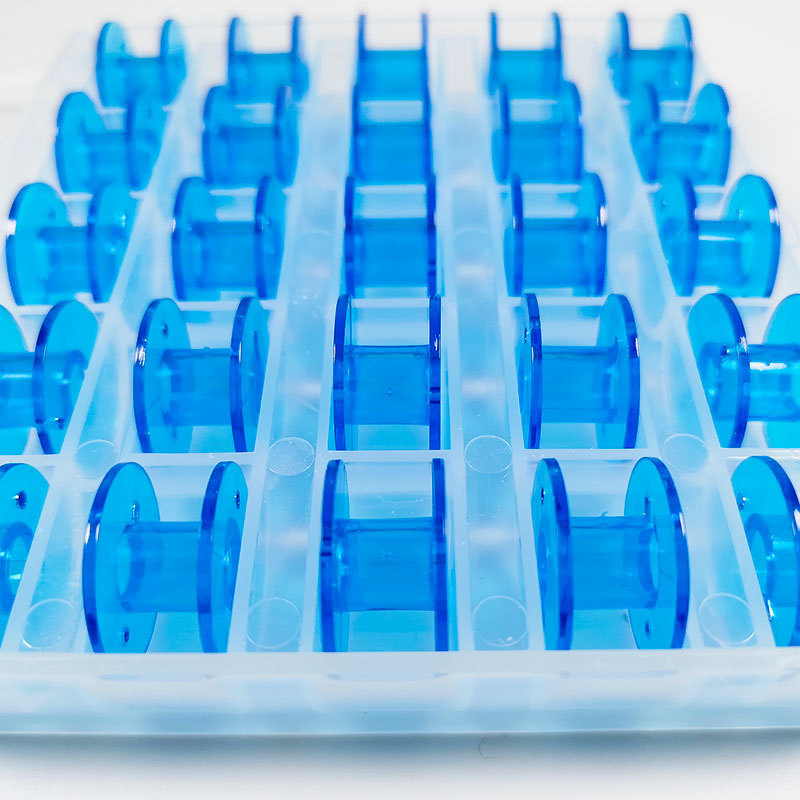 25 stk/æske spole til hjemmesymaskiner Spolekerne Plastspolekerne Blå med opbevaringsboks_voghion.com