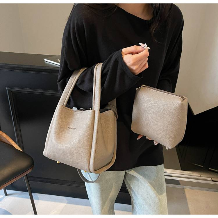 Zweiteilige, weiche Schultertasche mit Litschi-Muster für Mütter im Außenhandel. Neue, lässige, einfache, tragbare diagonale Tasche für das Leben._voghion.com