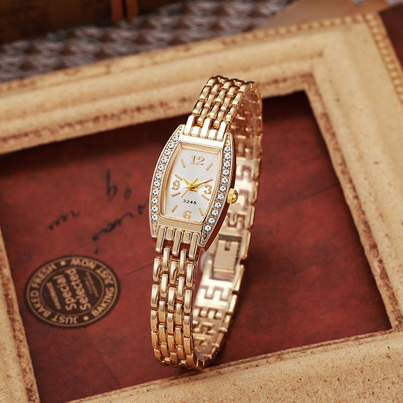 Nieuwe veelzijdige modepersoonlijkheid voor dames, tonvormig quartzhorloge met dunne band en strass_voghion.com