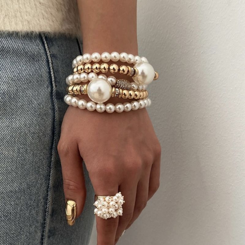 Braccialetto con perle esagerate a strati, elegante, grande, rotondo, micro intarsiato_voghion.com