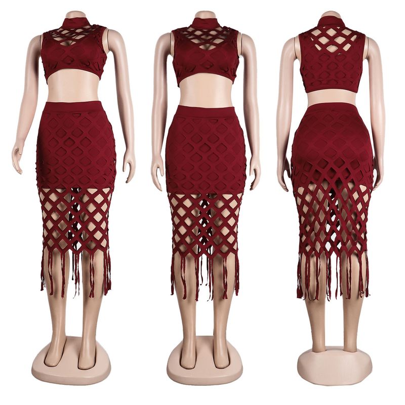 Abito da discoteca in due pezzi da donna, aderente, con nappe in rete cava, che copre i fianchi_voghion.com