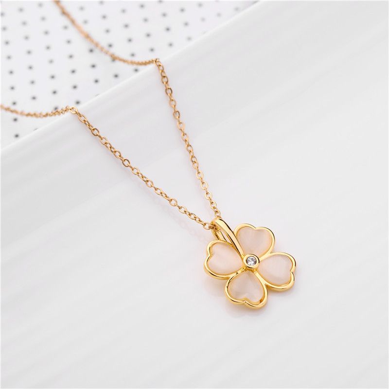 Nuova collana alla moda in acciaio al titanio con trifoglio a forma di fiore dorato con pietra occhio di gatto intarsiata, catena a maglia rossa da donna_voghion.com