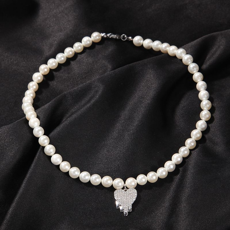 Elegante Herzperlenkette für Damen mit Zirkonia-Akzenten, ein minimalistisches Statement-Schmuckstück im leichten Luxusstil für jeden Tag_voghion.com