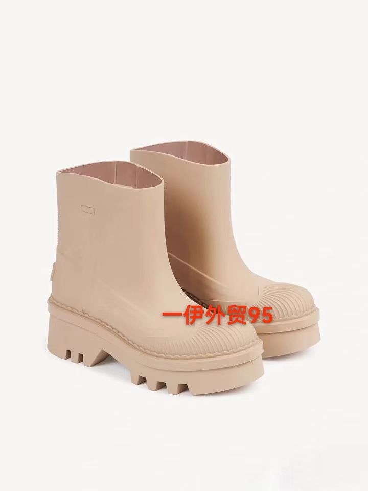 2024 Nuove scarpe da pioggia versatili alla moda slip-on con tubo corto, tinta unita, con punta a conchiglia, rifiniture a ventaglio, suola spessa e altezza maggiorata_voghion.com
