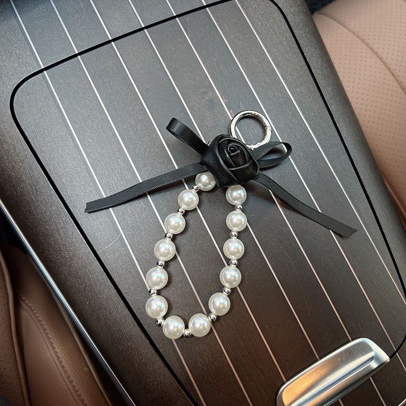 Portachiavi in pelle PU con piccola rosa e perla, stile coreano, con fiocco, fiore, ciondolo per borsa da donna_voghion.com