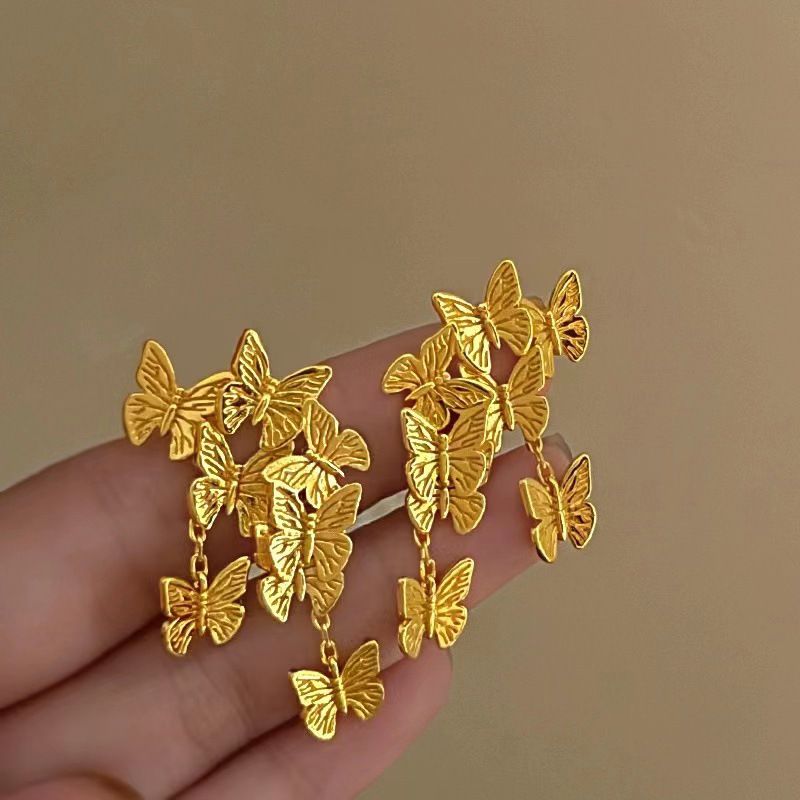 Nappa con fiore scavato con ago d'argento, alla moda, personalizzata, stile fresco e distaccato, lunga, elegante e di alta qualità._voghion.com