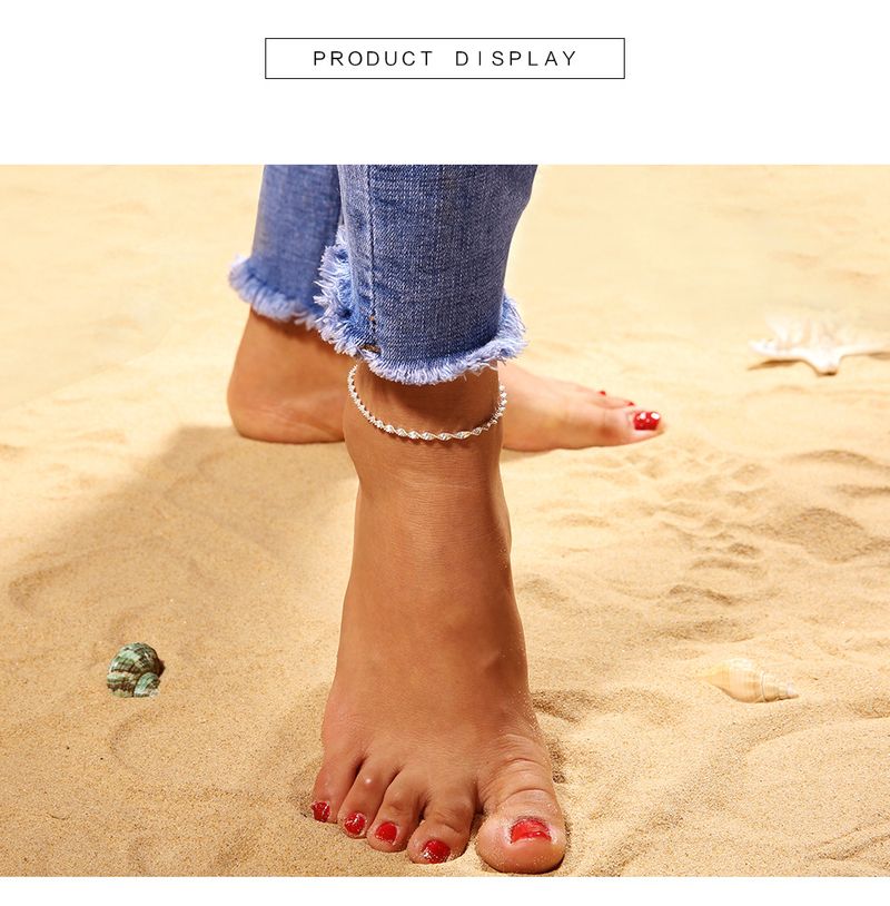 Joyería minimalista gótica con estampado de ondas de agua y tobillera de moda._voghion.com