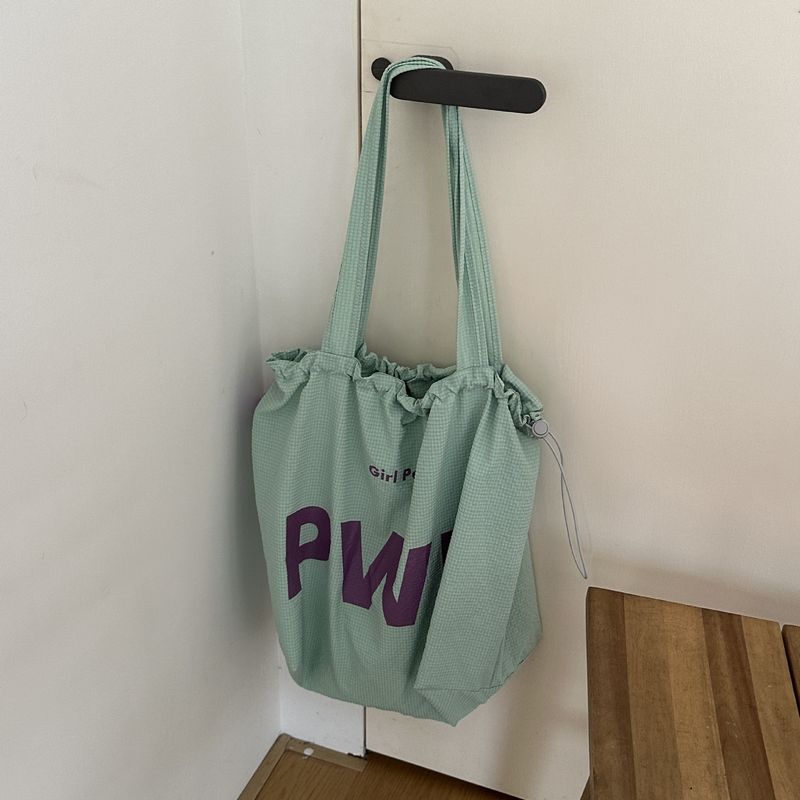 Borsa a secchiello versatile casual in nylon con stampa a lettere, modello 2025 da donna, con coulisse_voghion.com