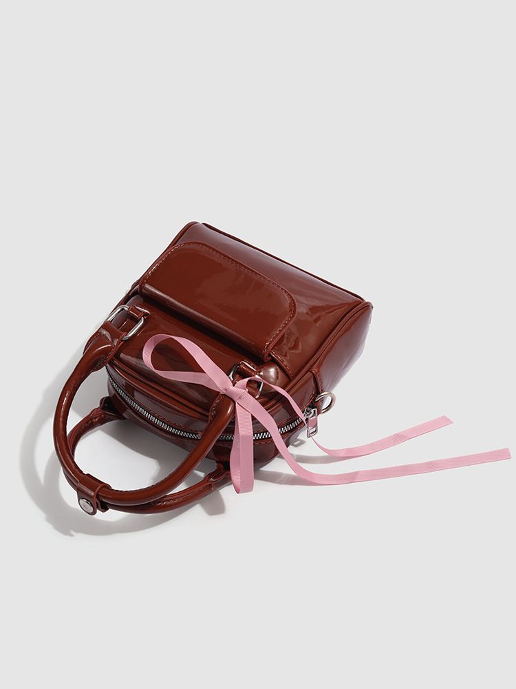 Elegante mini zaino con fiocco in pelle verniciata color cioccolato, borsa a tracolla alla moda e versatile_voghion.com