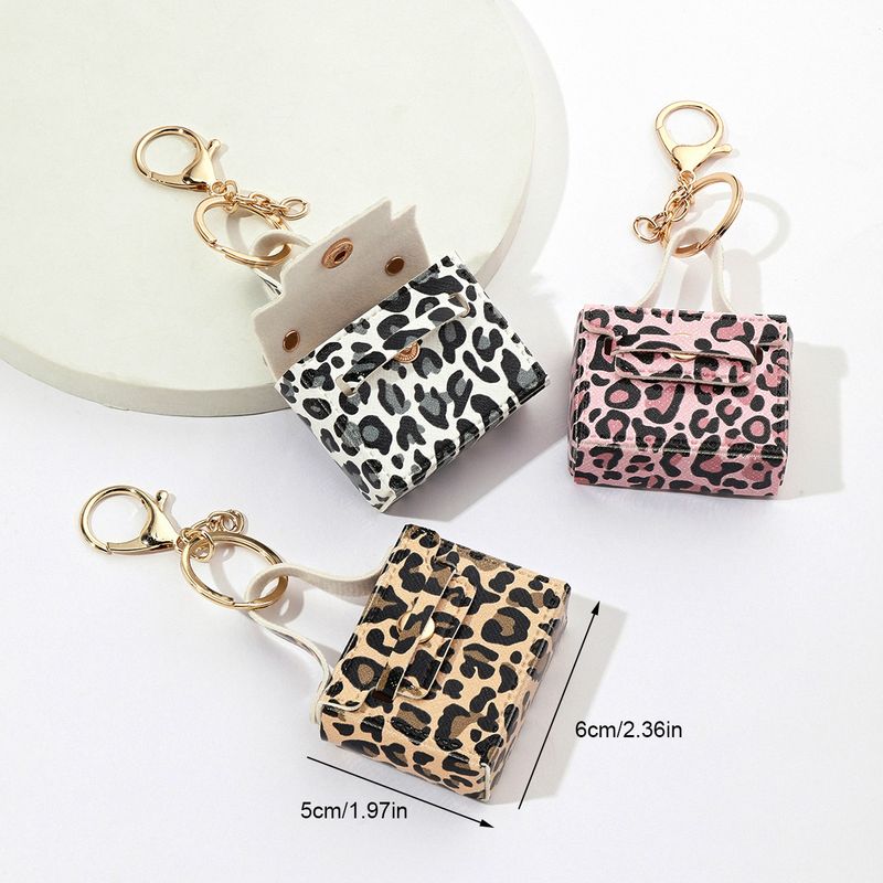Mini portachiavi con stampa leopardata - Elegante portachiavi per auto, ciondolo per telefono e accessorio regalo per donne e uomini (nero, bianco, rosa, leopardato classico)_voghion.com