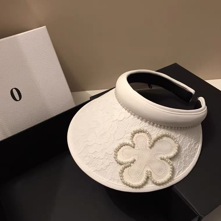 Top vuoto in stile forcina in pizzo jacquard coreano per viaggi estivi, parasole leggero con fiori di perle che riduce l'età e sole_voghion.com