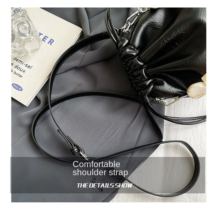 Autumn and winter minority foreign milk candy pearl drawstring fold Korean style advanced sense of light luxury 100 shoulder armpit oblique span bag_voghion.com