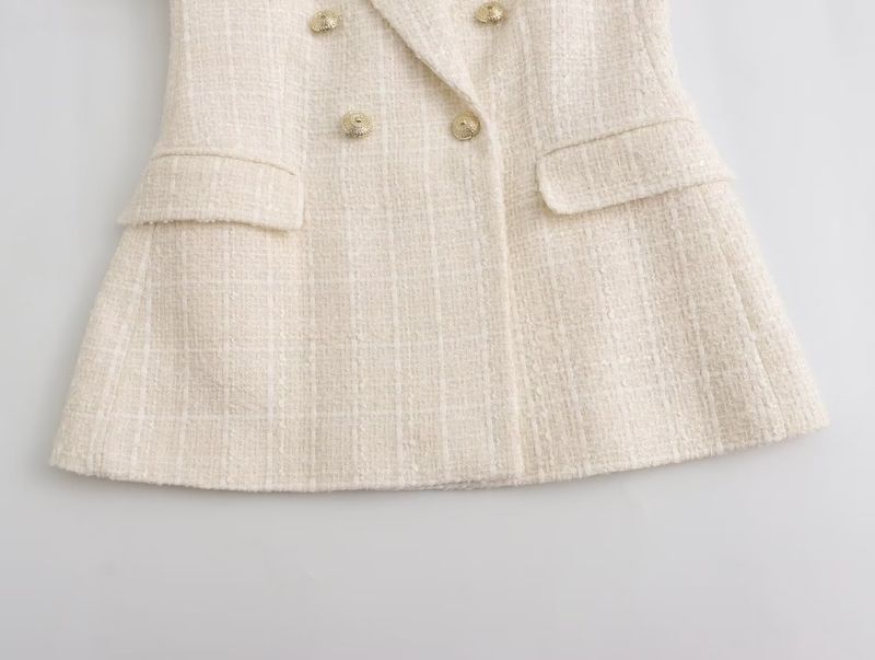Damjacka med lös kostym med textur och mode_voghion.com