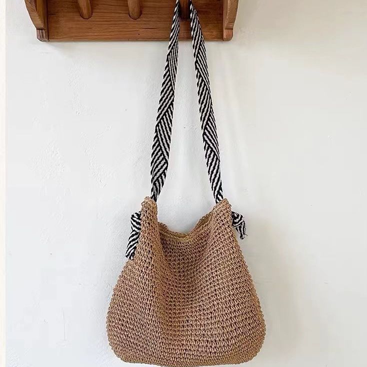 Borsa da spiaggia versatile per le vacanze da donna, realizzata a mano in stile navy coreano INS, 2024, in paglia, con una sola spalla, intrecciata_voghion.com