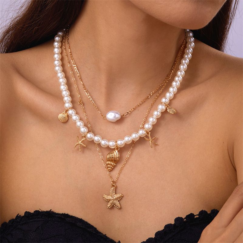 Ensemble de bijoux pour femme : collier multicouche en coquillage, perle et conque, style rétro estival, avec pendentif étoile de mer._voghion.com