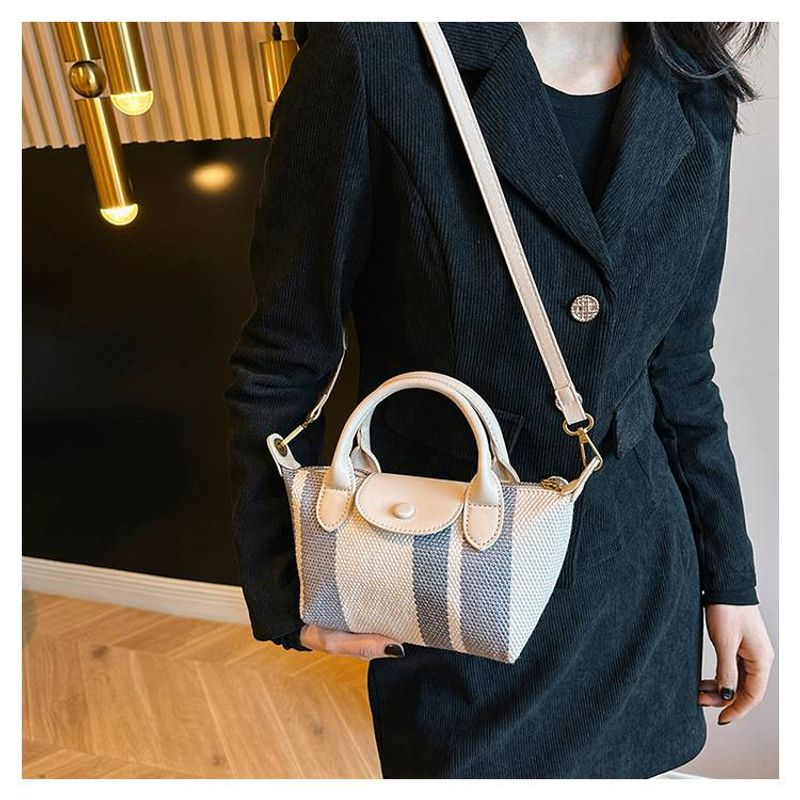 Die neue tragbare Knödeltasche Trendlinie von hochwertigen Stoffstreifen Single-Shoulder Crossbody Bag_voghion.com