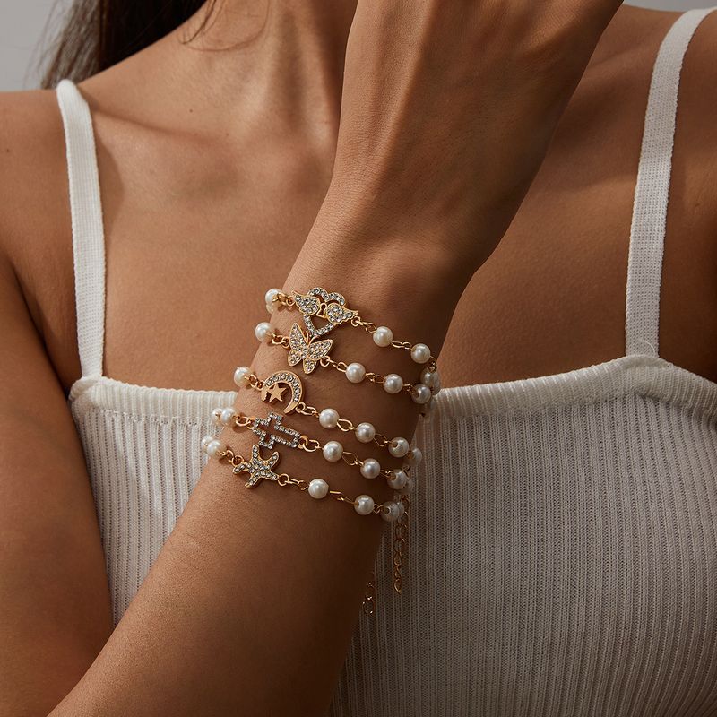 Bracelet créatif en forme de 8 avec perles creuses et strass pour femme_voghion.com
