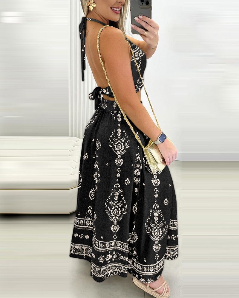 Completo due pezzi da donna con top stampato con scollo all'americana e gonna con spacco_voghion.com