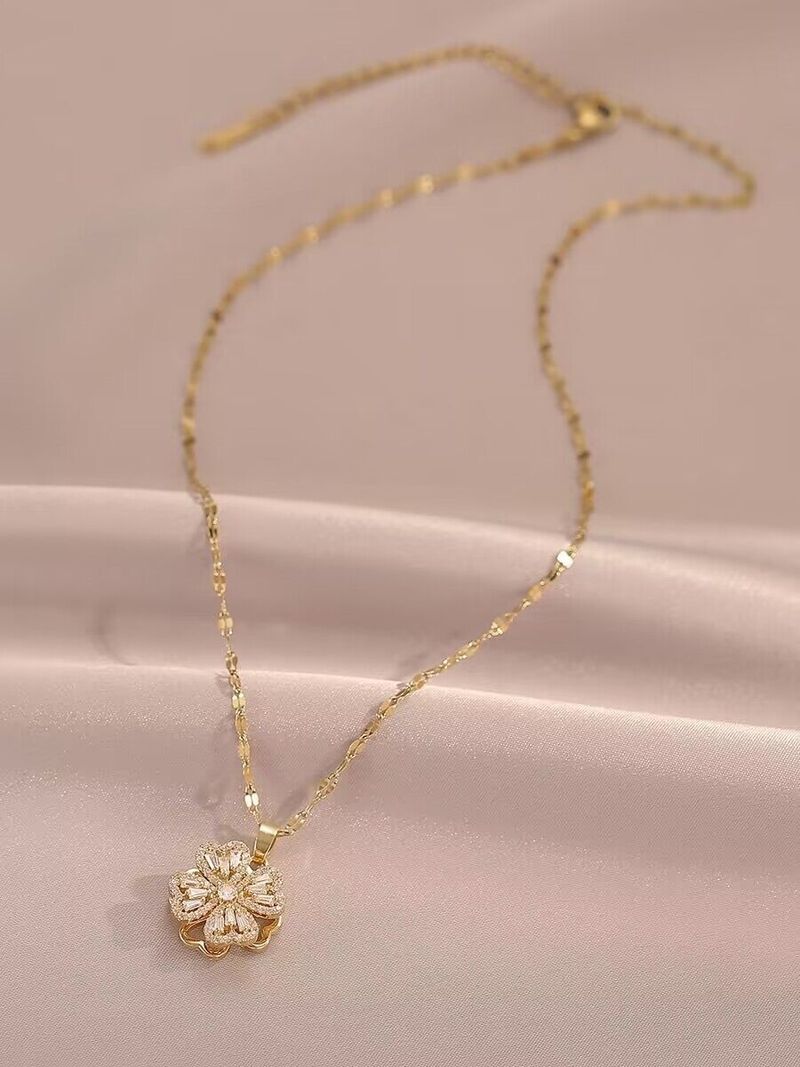 Rotatable Light Luxury High-end Full Diamond Flower Open Fashion Personality Rotating Niche Design Ring_voghion.com