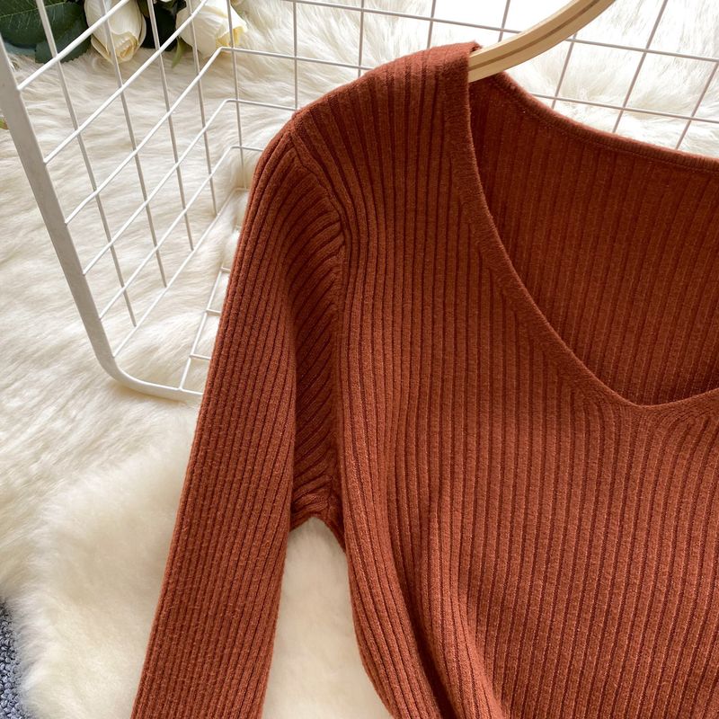 Vêtements pour femmes Robe tricotée de couleur unie de luxe haut de gamme légère française pour femmes automne et hiver conception de taille à col en V jupe longue de tempérament de niche_voghion.com
