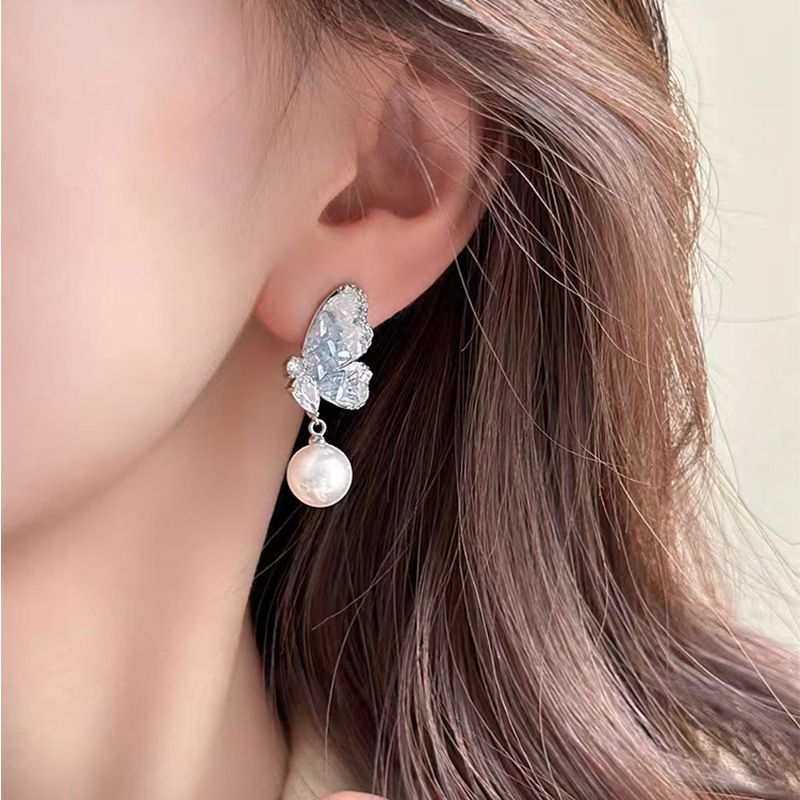 2023 New Niche Super Fairy Temperament Butterfly Ear Clips Women's High-end Light Luxury Sparkling Diamond Exquisite_voghion.com