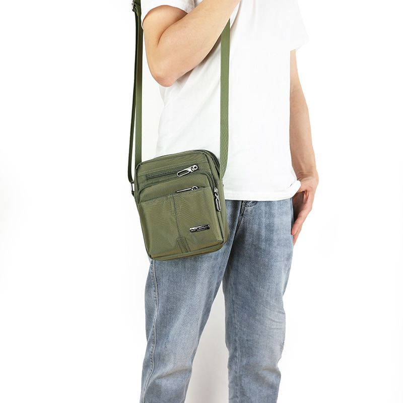 2025 Spring And Summer New Trend Men's Mini Bag Waterproof Nylon Oxford Canvas Shoulder Crossbody Casual Backpack Versatile_voghion.com