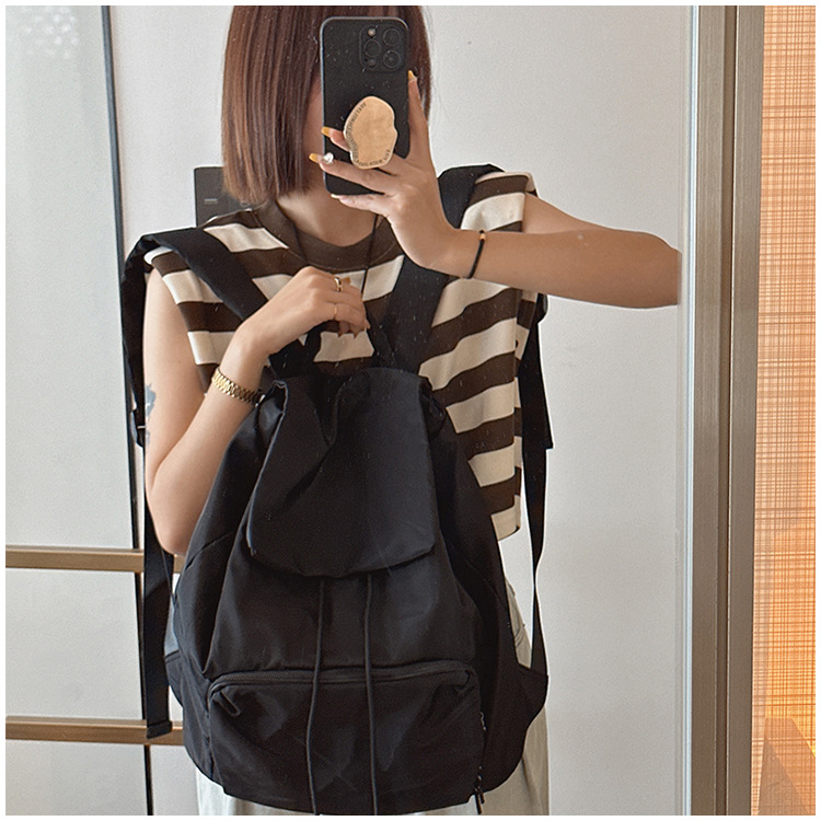 South Korea's new drawstring for women's leisure, large capacity student backpack, versatile and lightweight Oxford_voghion.com