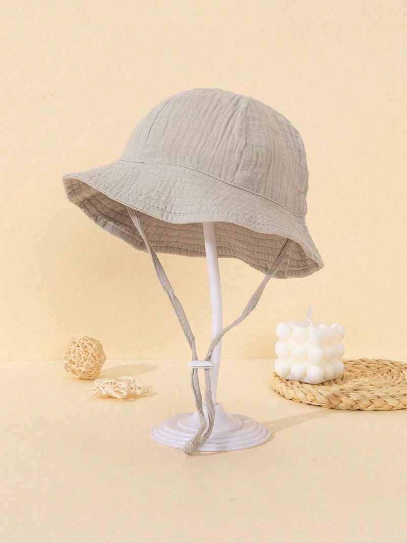 1 cappello da sole per neonati con fiocco stampato, adorabile cappello da pescatore morbido e traspirante in tinta unita per attività all'aperto, adatto per primavera/estate._voghion.com