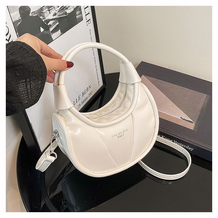 Elegante und stilvolle Damen-Umhängetasche in Mondform mit Seilknoten-Akzent – ideal für den Alltag._voghion.com