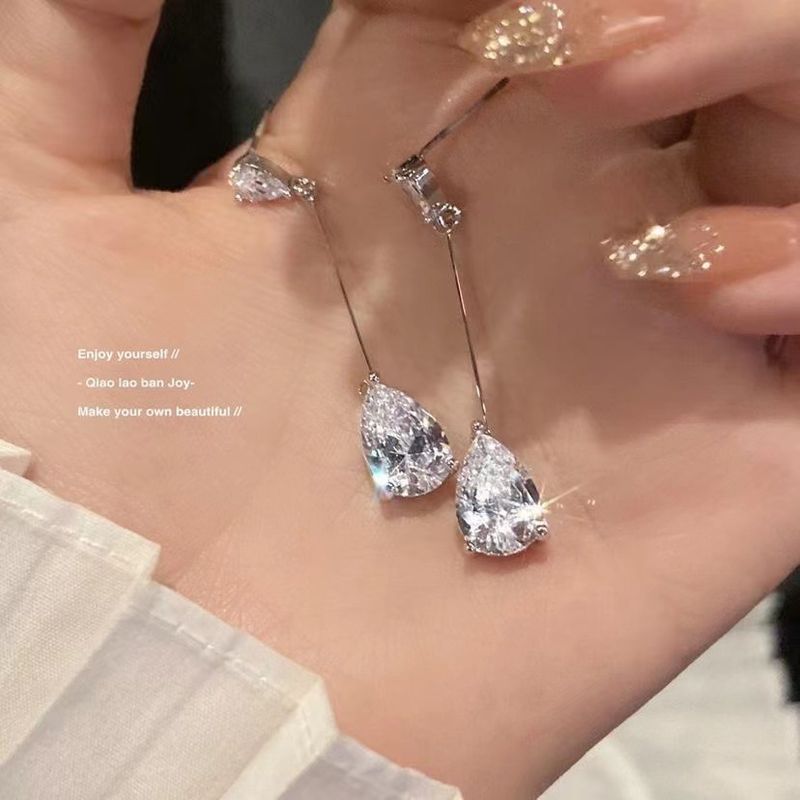 Nuevos pendientes de aguja de plata con forma de gota de agua, elegantes, sencillos, exquisitos y con personalidad que no se decoloran._voghion.com