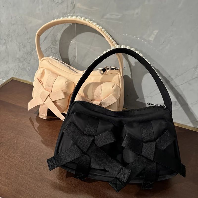 Niche Internet Celebrity Casual Hundred Pearls Strap Bow Single Shoulder Underarm Handbag 2025 Spring And Summer New Fashion Hundred_voghion.com