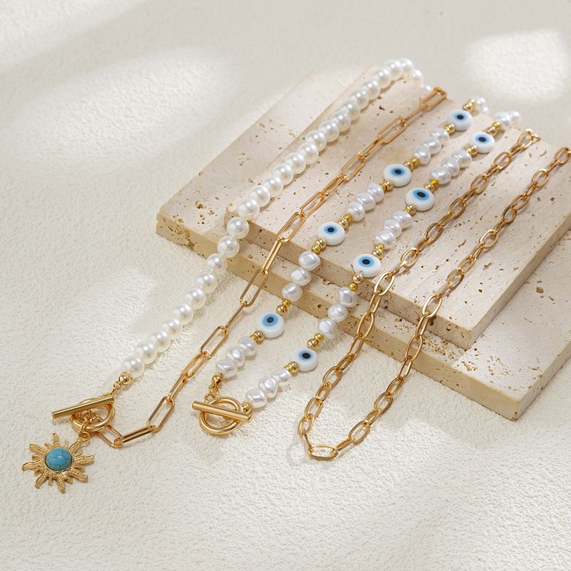Gioielli transfrontalieri europei e americani, collana di perle di forma speciale in stile etnico, catena a clavicola in lega retrò con ciondolo a forma di occhio di sole_voghion.com