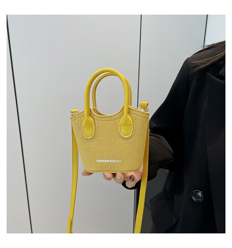 Borsa a secchiello da donna, alla moda, con tracolla monospalla, stile Candy Lover, con rossetto, da portare a spalla, rossa_voghion.com