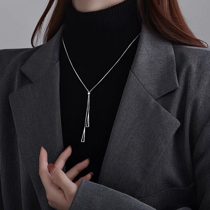 2025 Damenmode Modische minimalistische silberne Damenkette mit langen Quasten und geometrischem Reißverschlussdesign, Schlüsselkette, 2024 Schmuckkette_voghion.com