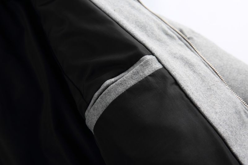 Piumino con collo alto, lungo cappotto in piuma con trama intrecciata a rombi per donna_voghion.com