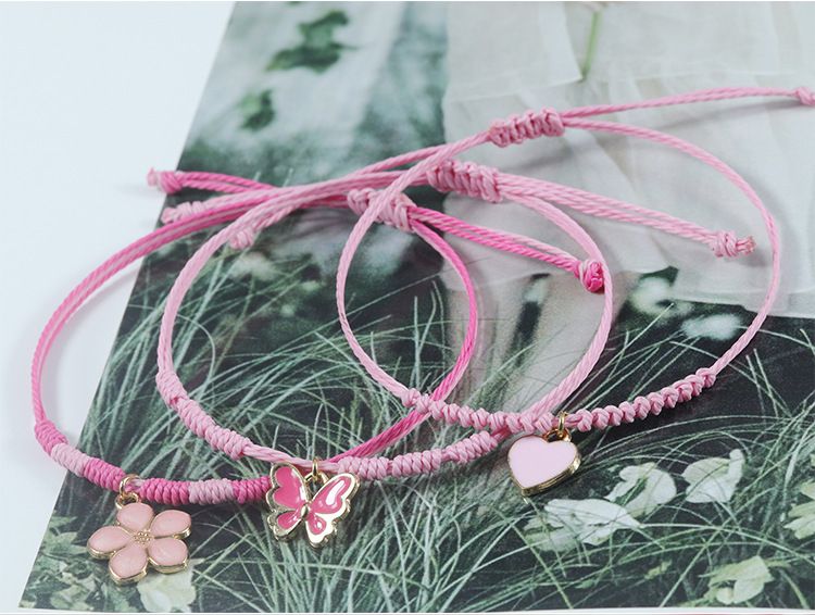 Bransoletka pleciona Pink Clover Love z różowym motylem i sznurkiem_voghion.com