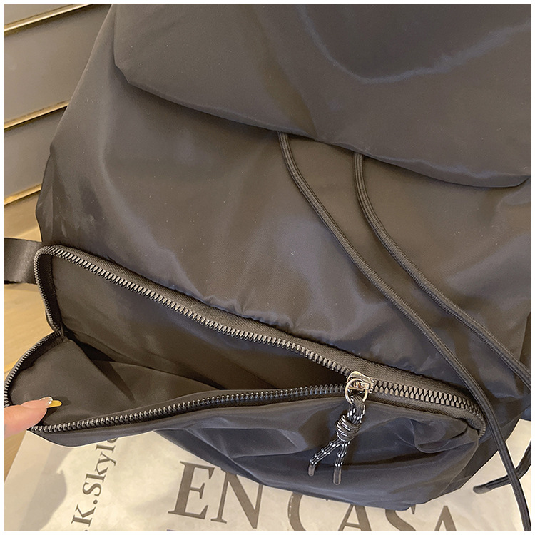 South Korea's new drawstring for women's leisure, large capacity student backpack, versatile and lightweight Oxford_voghion.com