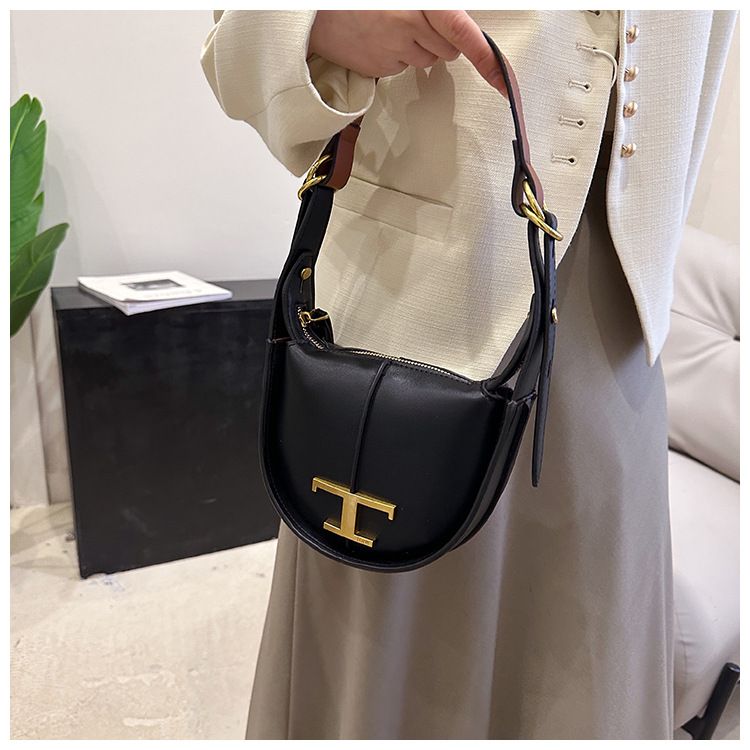 2024 nou geantă semilună din piele naturală geantă de nișă cu jumătate de lună la subrat geantă de șa producătorii de genți de umăr en-gros_voghion.com