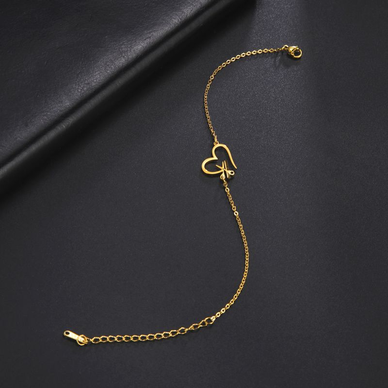 Stainless steel bracelet creative design sense of love hair tool pendant bracelet jewelry_voghion.com