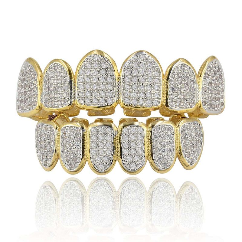 Gioielli per uomo e donna, apparecchi ortodontici con microdiamanti, denti da vampiro_voghion.com