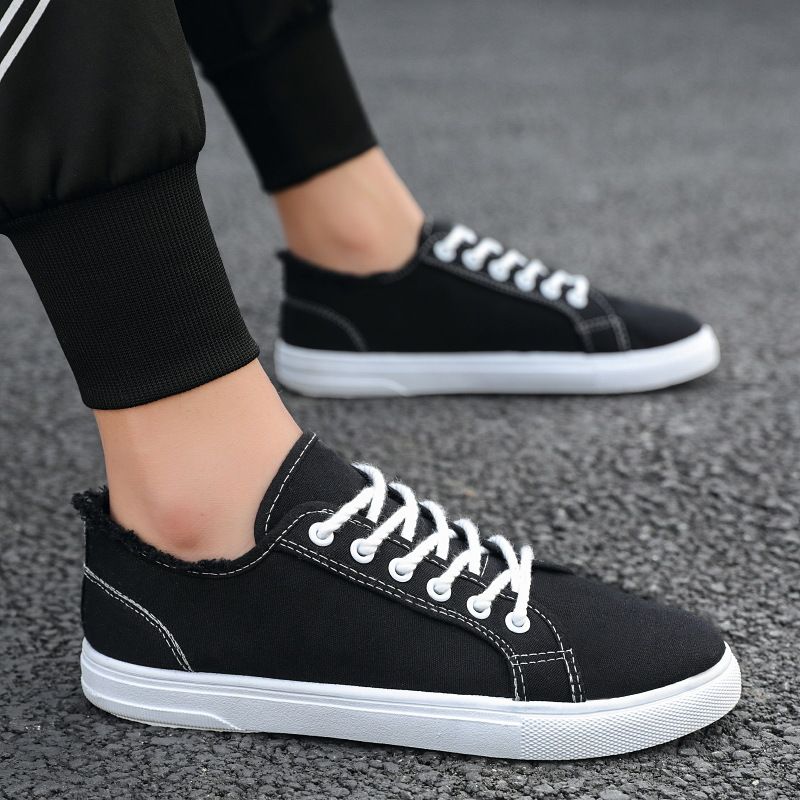 Scarpe da uomo in tela, scarpe bianche basse con suola morbida, alla moda e casual, con un solo piede, versione coreana per studenti, alla moda._voghion.com