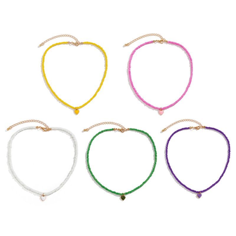 Pronta consegna Piccole perline di semi con ciondolo a forma di cuore Collana per donna Trendy Ladies Perline Catena sul collo Choker Collare 2024 Moda_voghion.com