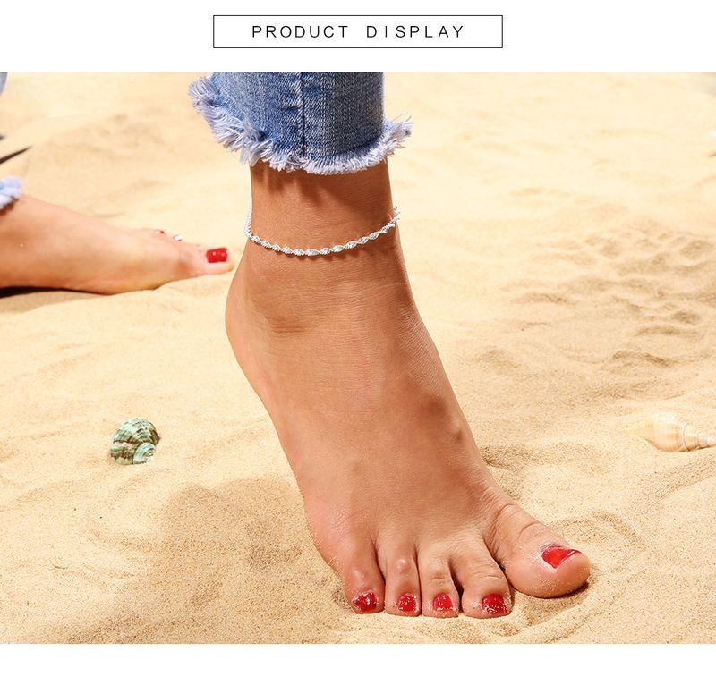 Joyería minimalista gótica con estampado de ondas de agua y tobillera de moda._voghion.com