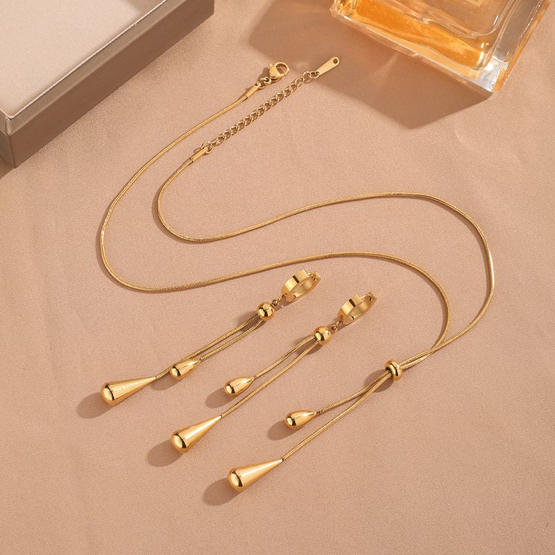 Set di orecchini con collana di nappe di lusso leggero, set di gioielli in acciaio al titanio alla moda e di fascia alta_voghion.com