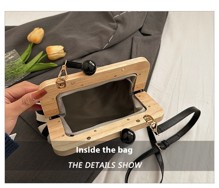2024 Borsa da donna nuova Borsa a tracolla in tela con clip in legno a righe Borsa a tracolla con una spalla alla moda e raffinata_voghion.com