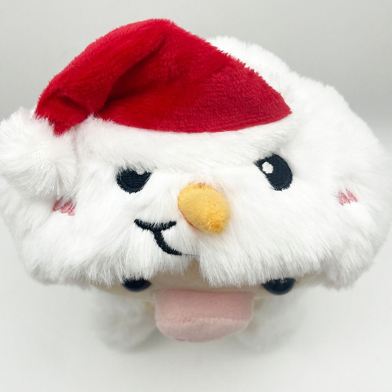 Adorabile peluche a forma di maialino natalizio con disegni di Babbo Natale e renne per una gioia natalizia_voghion.com
