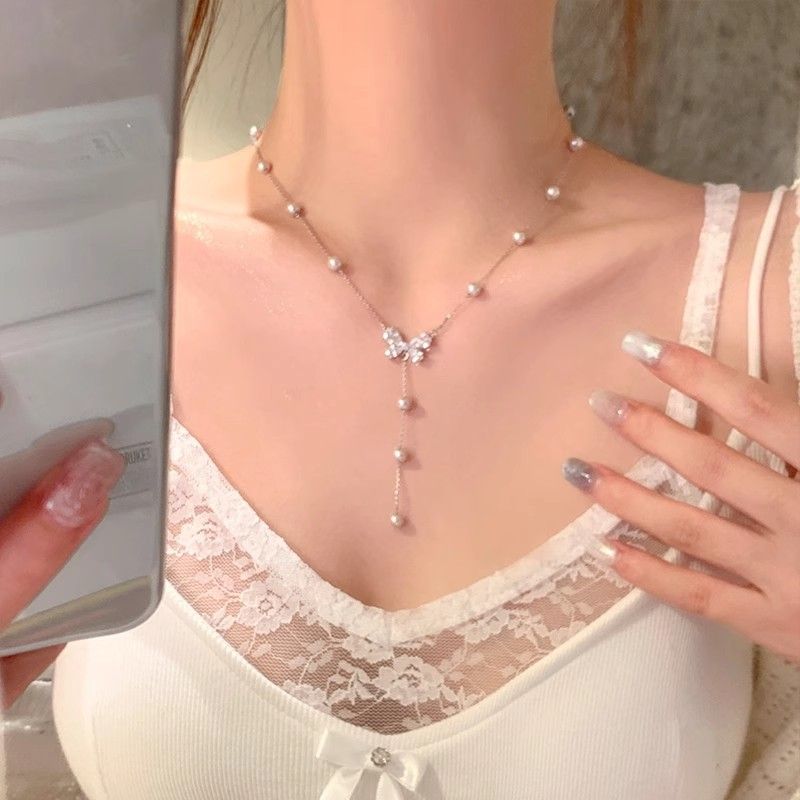 Collana a farfalla con zirconi e perle per vacanze al mare - Delicata catena per clavicola da donna, design di nicchia leggero e lussuoso_voghion.com